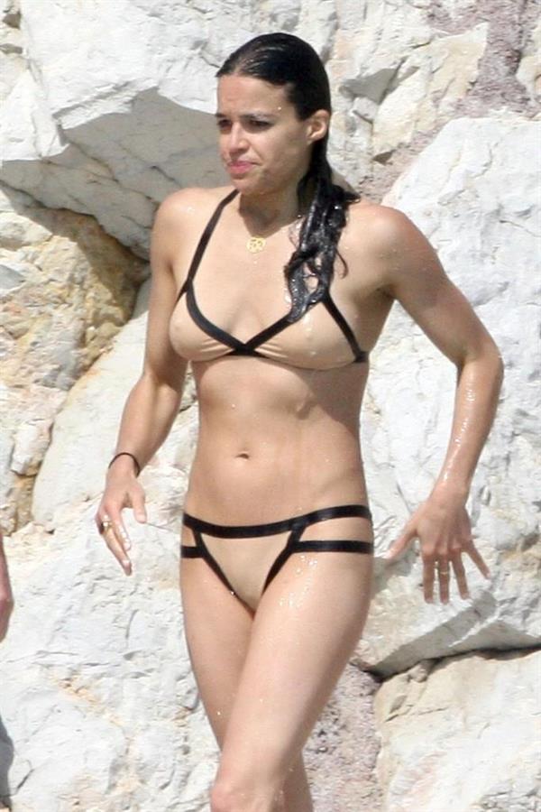 Michelle Rodriguez in a bikini - breasts