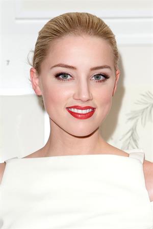 Amber Heard attends Tasya van Rees private viewing of Distorted Delicacies on June 22, 2011