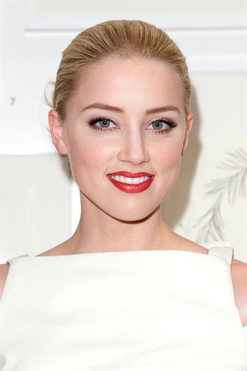 Amber Heard attends Tasya van Rees private viewing of Distorted Delicacies on June 22, 2011