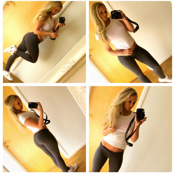 Anna Nyström taking a selfie and - ass