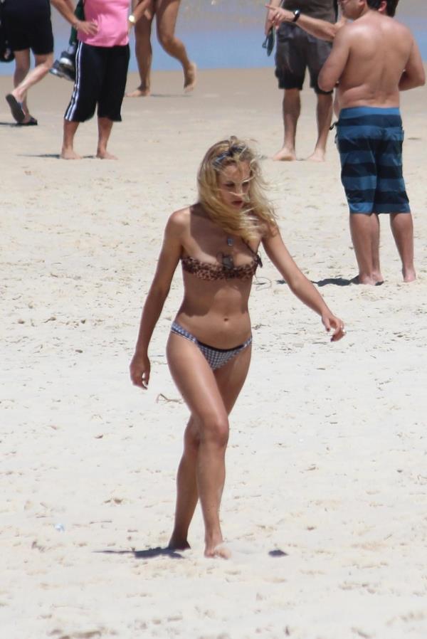 Alice Dellal in a bikini
