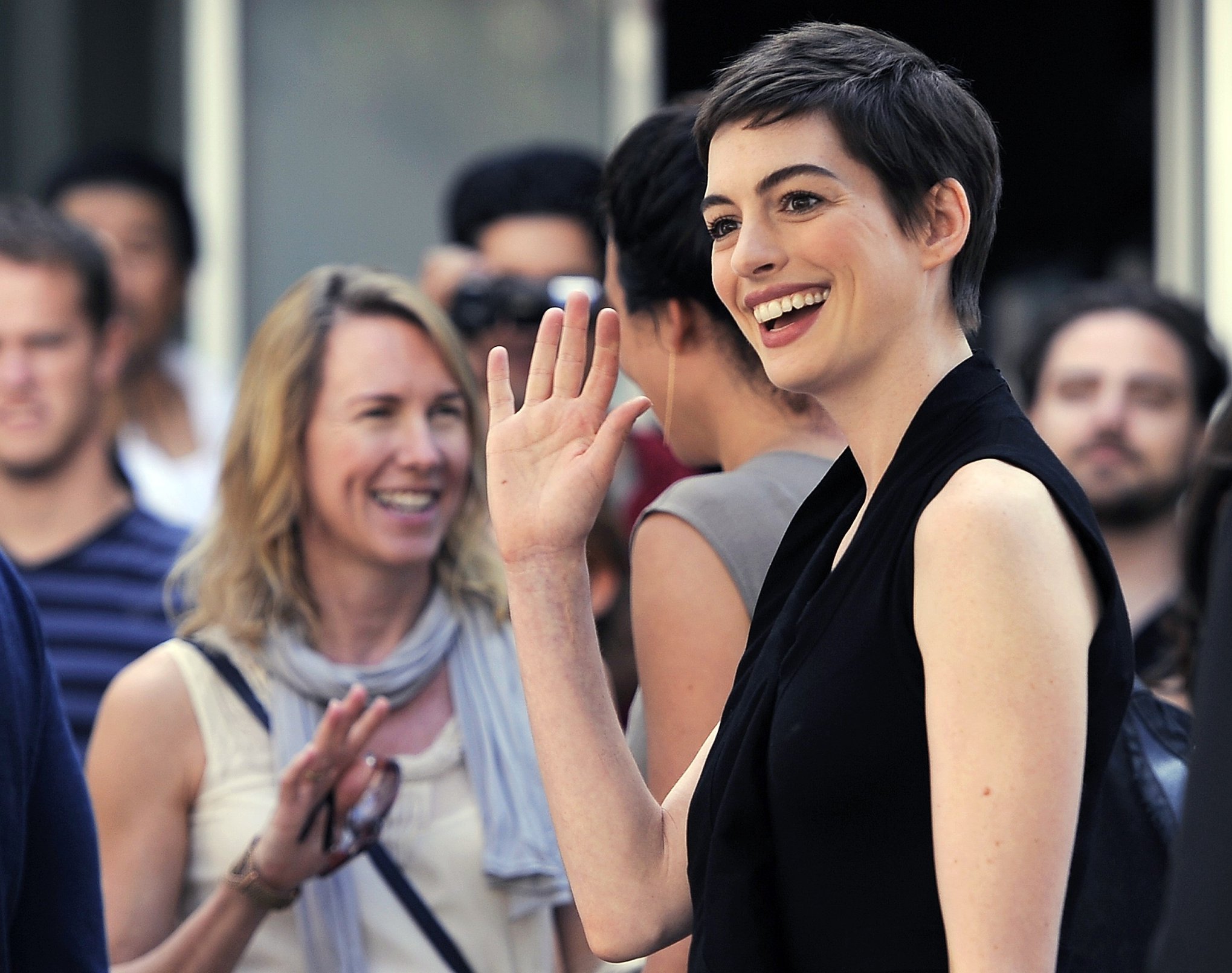 Anne Hathaway Christopher Nolan immortalized with hand and footprint ceremony on July 7, 2012