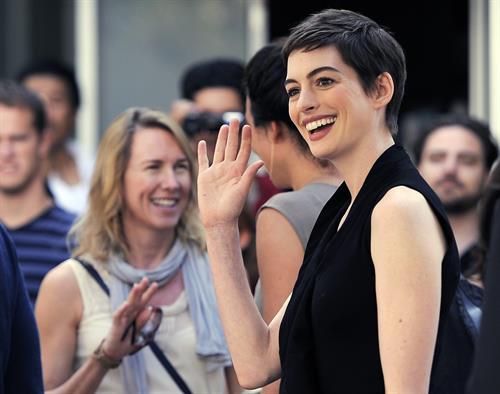 Anne Hathaway Pictures Anne Hathaway Christopher Nolan immortalized with hand and footprint ceremony on July 7, 2012