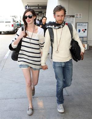 Anne Hathaway arrives at LAX airport in Los Angeles on September 3, 2011