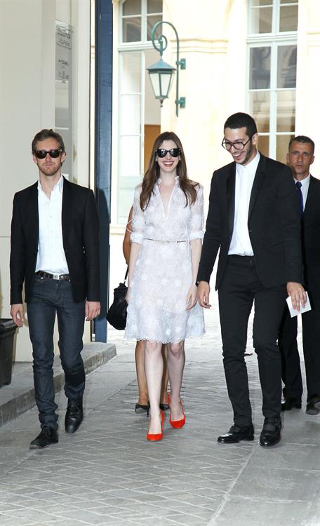 Anne Hathaway Pictures Anne Hathaway Givenchy private show for Anne Hathaway then visiting Chopard Jewelry in Paris on July 6, 2011