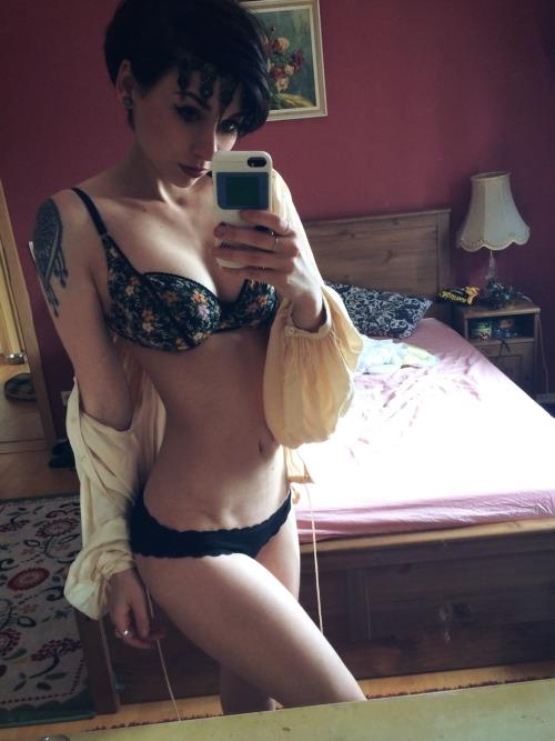 Anonymous in lingerie taking a selfie