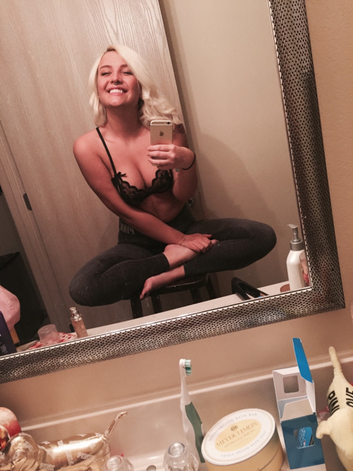 Anonymous in lingerie taking a selfie