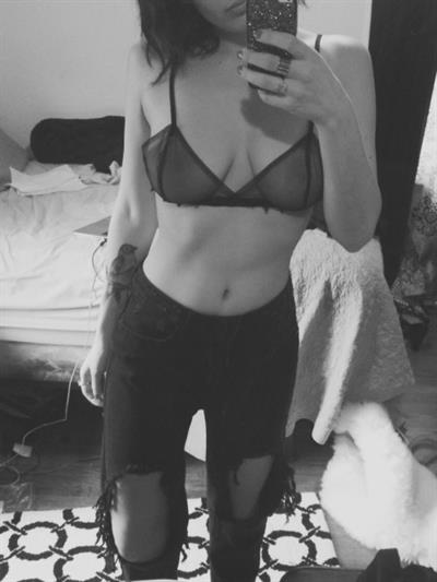 Anonymous in lingerie taking a selfie