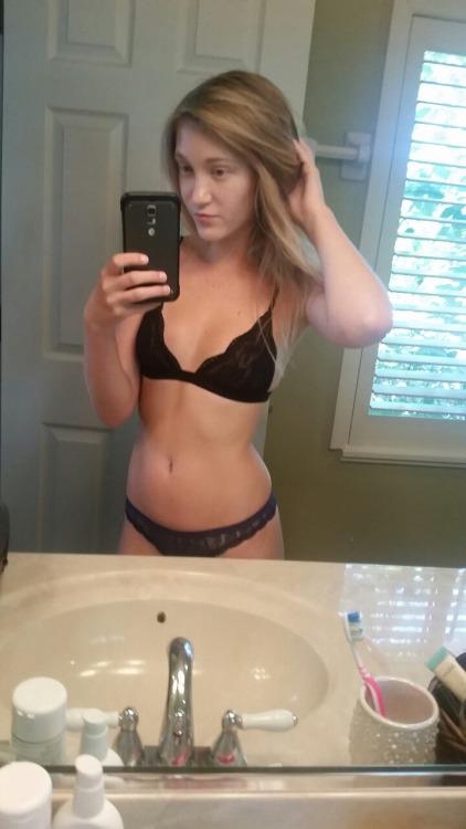 Anonymous in lingerie taking a selfie