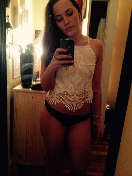 Anonymous in lingerie taking a selfie