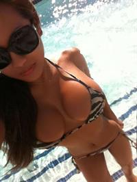 Anonymous in a bikini taking a selfie