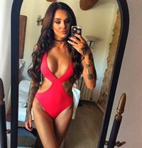 Anonymous in a bikini taking a selfie