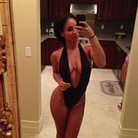 Anonymous in a bikini taking a selfie