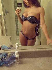 Anonymous in a bikini taking a selfie