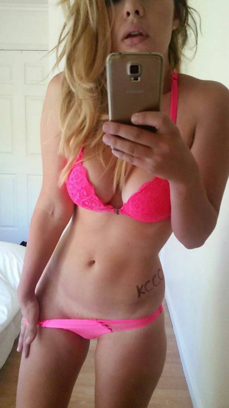 Anonymous in lingerie taking a selfie