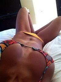 Anonymous in a bikini taking a selfie
