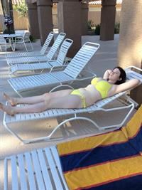 Anonymous in a bikini taking a selfie