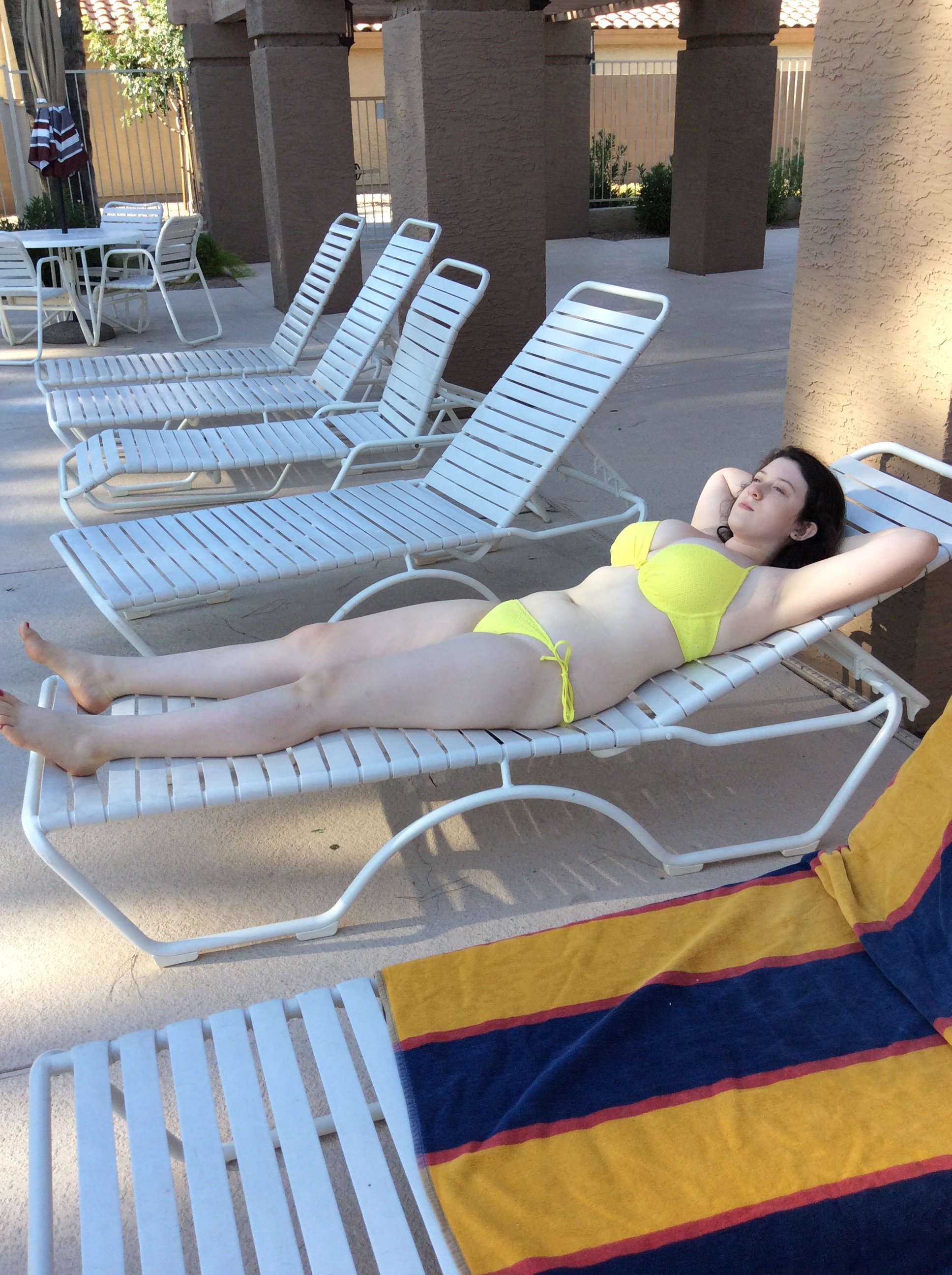 Anonymous in a bikini taking a selfie