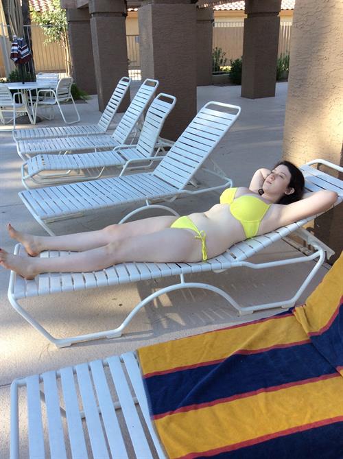 Anonymous in a bikini taking a selfie