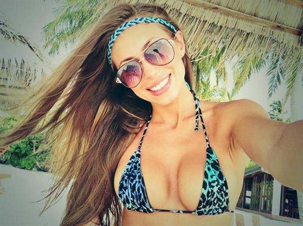 Galinka Mirgaeva in a bikini taking a selfie
