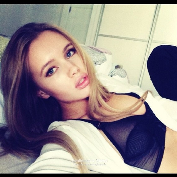 Olya Abramovich in lingerie taking a selfie