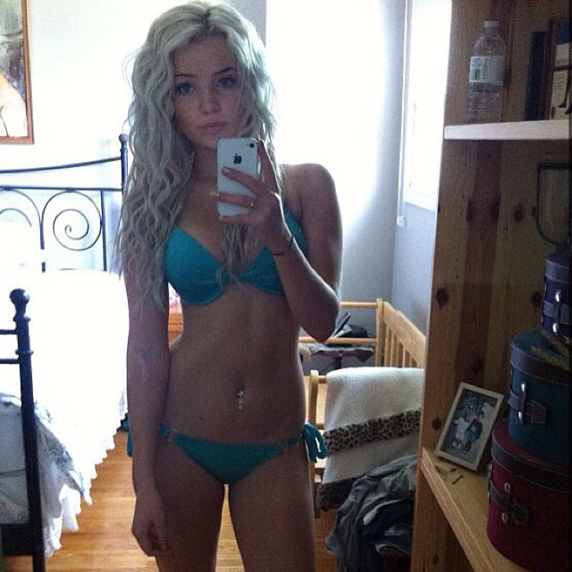 Anonymous in a bikini taking a selfie