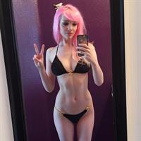 Lyz Brickley in a bikini taking a selfie