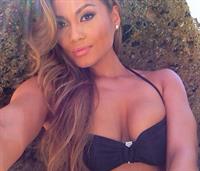 Daphne Joy in a bikini taking a selfie