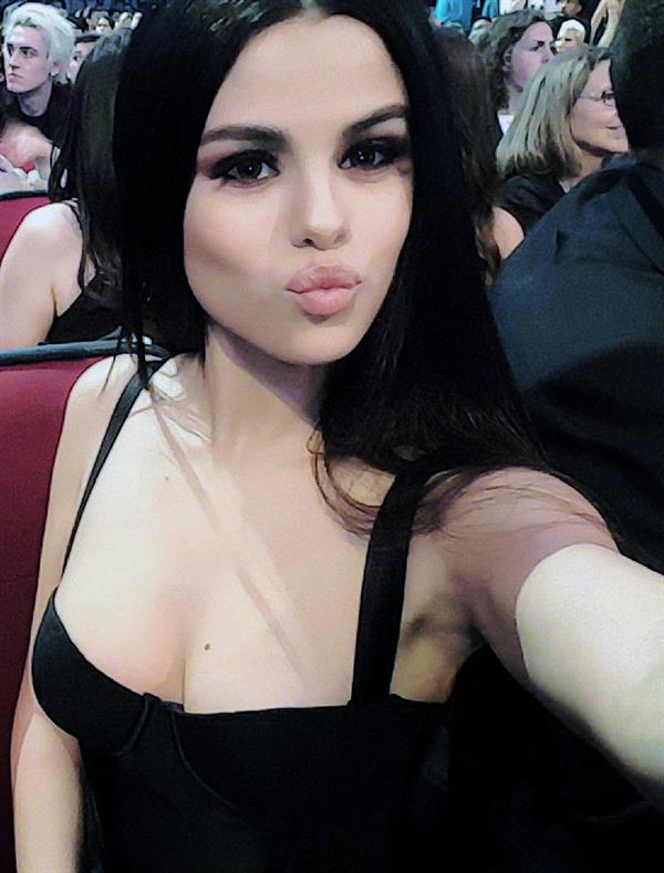 Selena Gomez taking a selfie