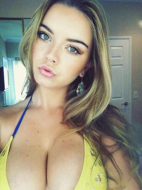 Lauren Hanley in a bikini taking a selfie