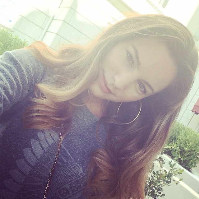 Kelly Brook taking a selfie