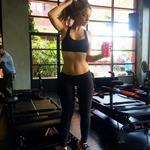 Emily Sears in Yoga Pants taking a selfie