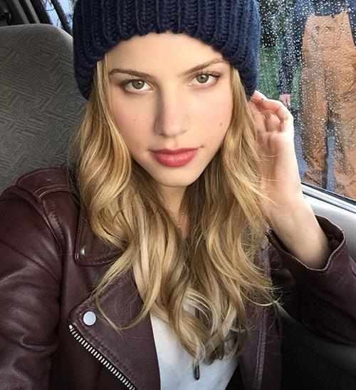 Halston Sage taking a selfie