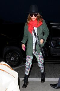 Jessica Alba arrives for an early morning flight at LAX, June 10, 2014