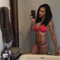 Bella Falconi in a bikini taking a selfie