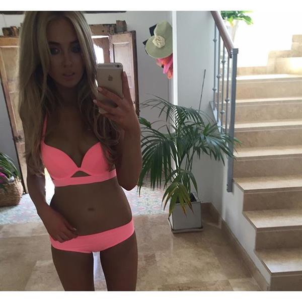 Nicola Hughes in a bikini taking a selfie