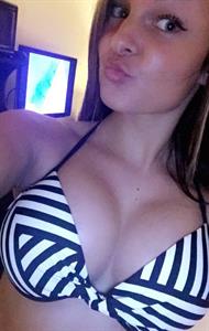 Anonymous in a bikini taking a selfie