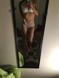 Anonymous in lingerie taking a selfie