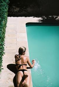 Megan Blake Irwin in a bikini - ass