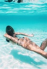 Devin Brugman in a bikini - ass