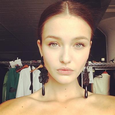 Kristina Romanova taking a selfie