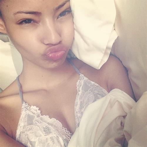 Malaika Firth in a bikini taking a selfie