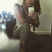 Sasha Lane taking a selfie