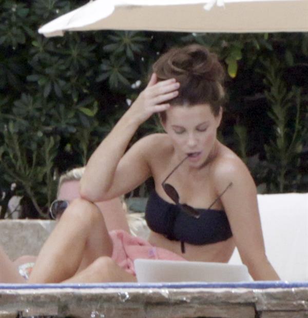 Kate Beckinsale in bikini as she fits in some sunbathing on family holiday in Mexico March 28-2013 