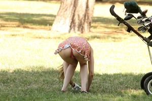 Alicia Arden golfing in a tiny skirt.  Upskirt pink panties.
