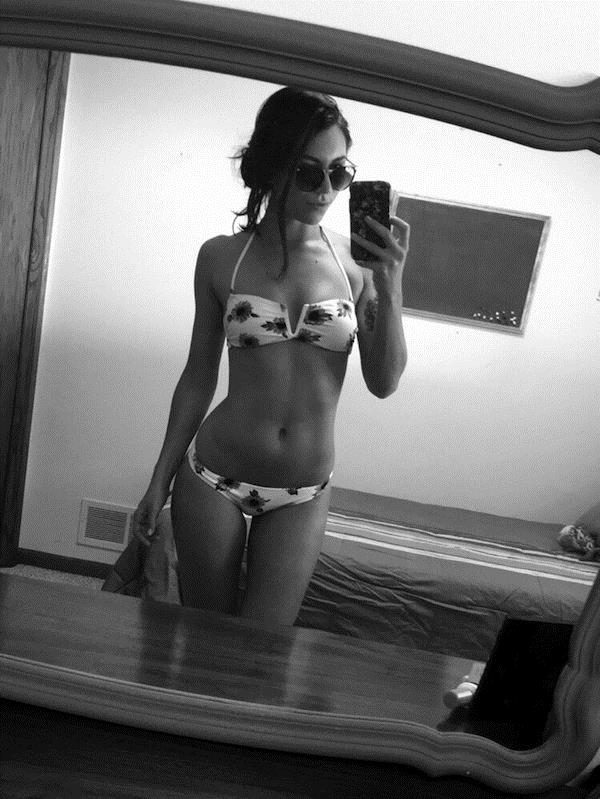 Anonymous in a bikini taking a selfie