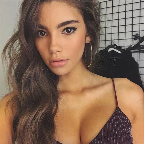 Cindy Mello in a bikini taking a selfie