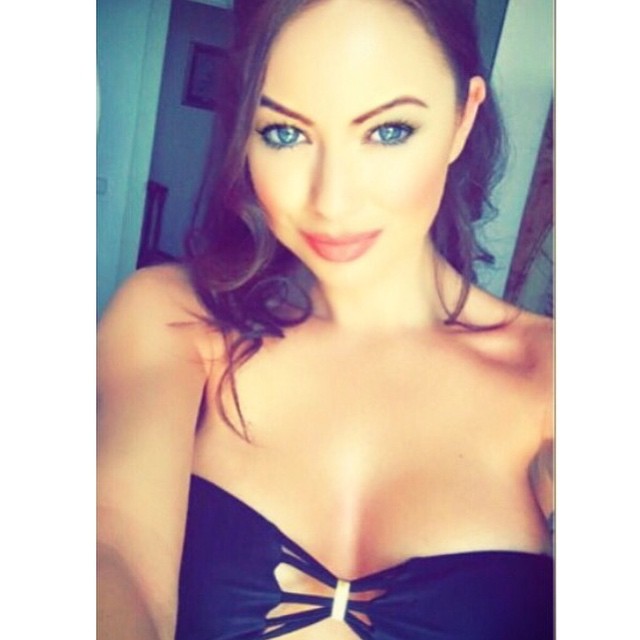 Laura Carter in a bikini taking a selfie