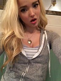 Dove Cameron taking a selfie