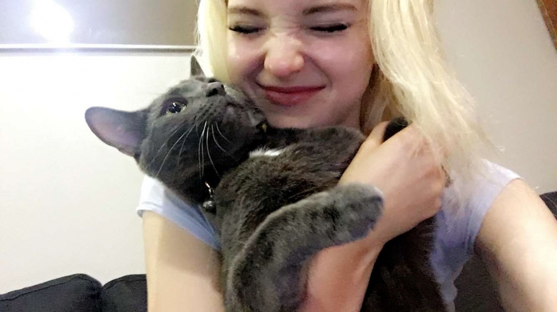 Dove Cameron taking a selfie